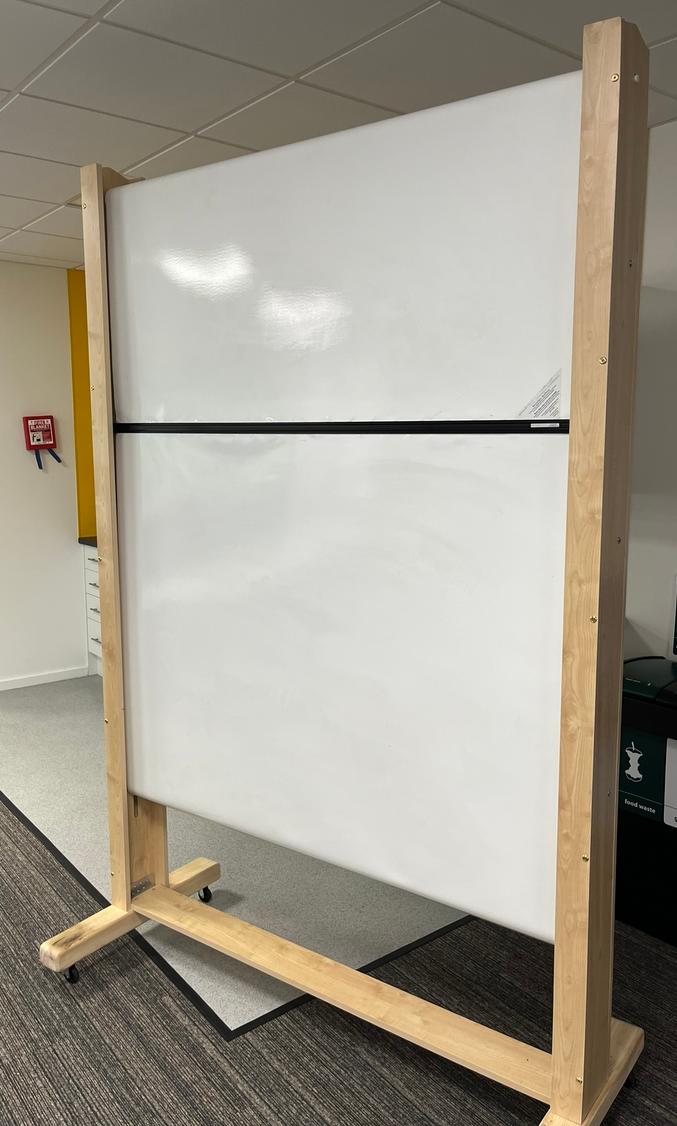 Picture of a rolling whiteboard in a frame on wheels